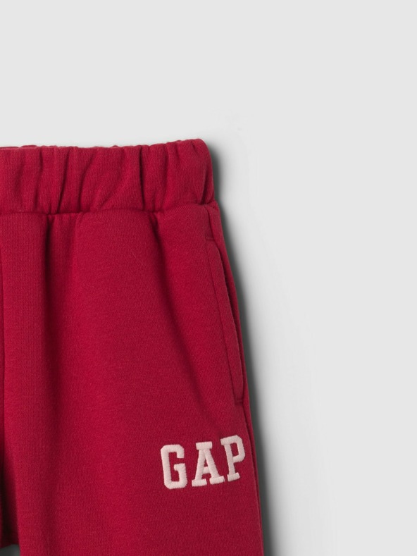 GAP Baby pantaloni de trening largi cu logo GAP
